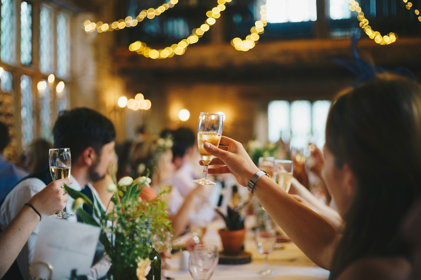 Guests raising a toast together at an event